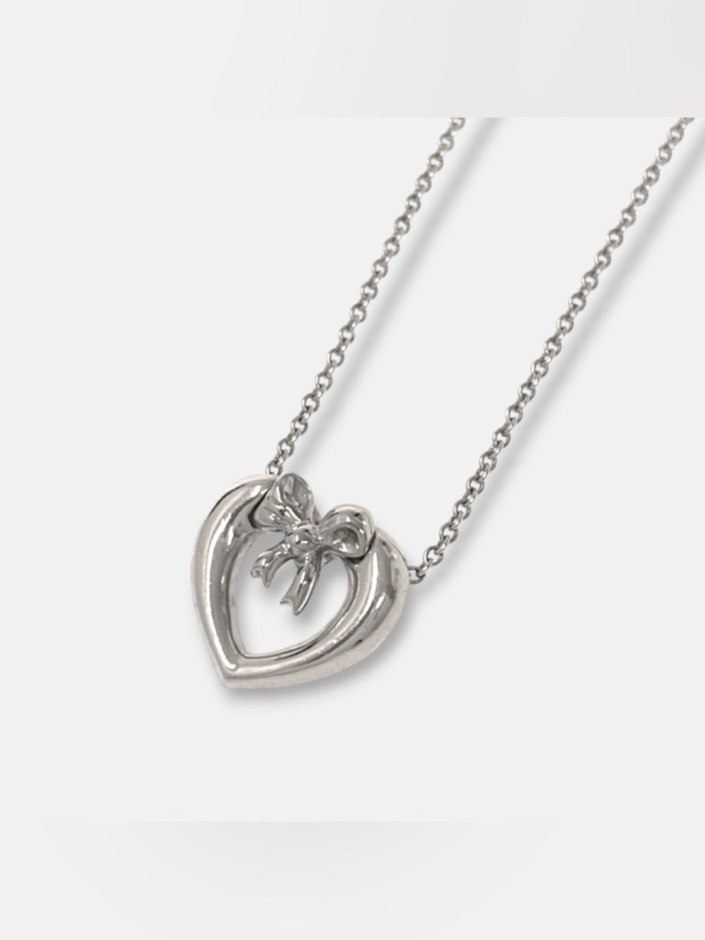 Tiffany & Co *Rare* Vintage 925 Sterling Silver Open Heart Bow Necklace Auth